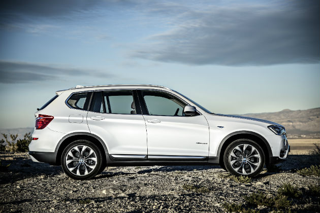 White BMW X3 side profile
