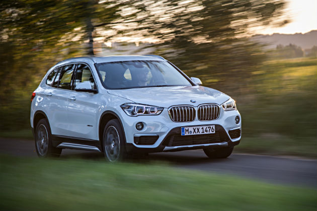 White BMW X1 in the countryside